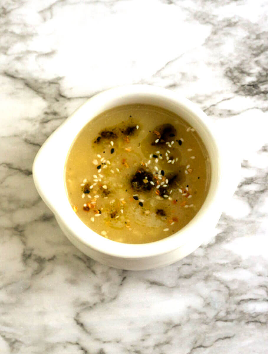 Congee1-2 Congee in white bowl on a marble background