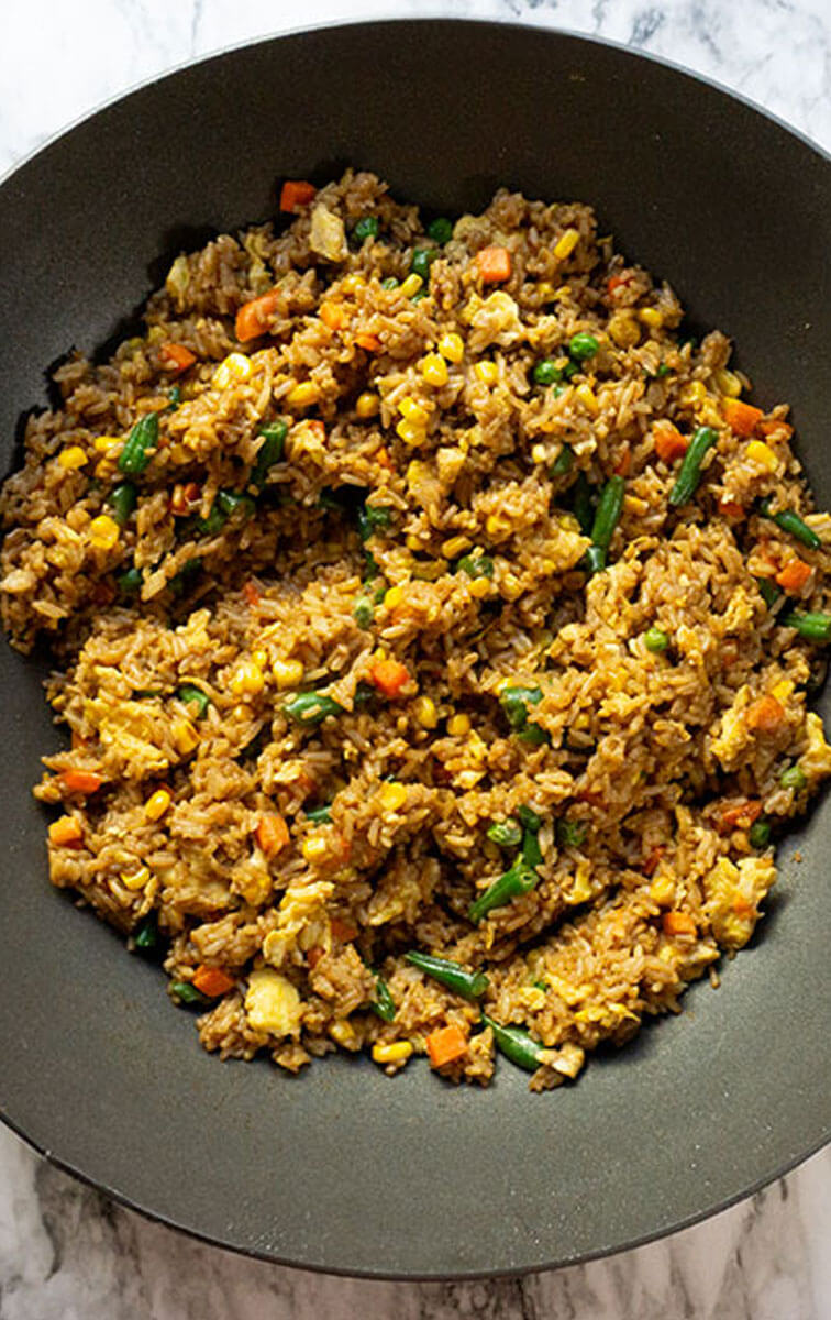 EggFriedRice1-2 Egg fried rice and vegetables in a wok