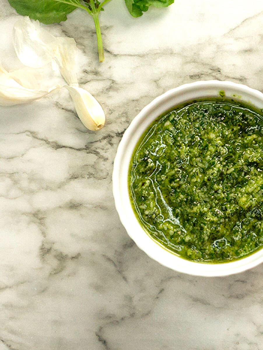 pesto2-2 baked beans in cast iron skillet with wooden spoon