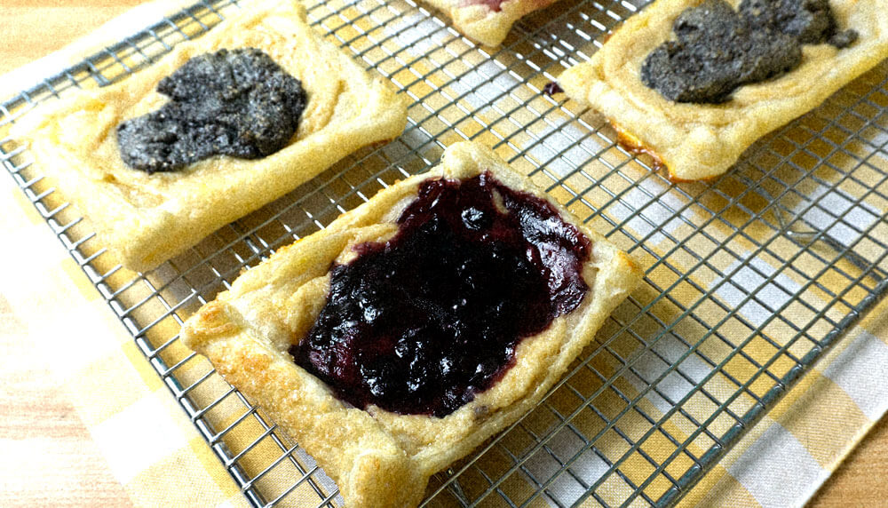 open face puff pastry with blueberry and cream cheese filling.